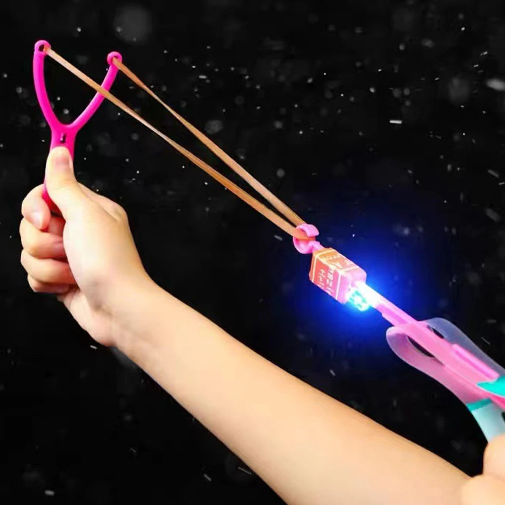 Rocket Slingshot Flying Toys with LED Lights 10Pcs LED Arrow Helicopters + 10Pcs Launchers Flying Toys Luminous Slingshot Toys